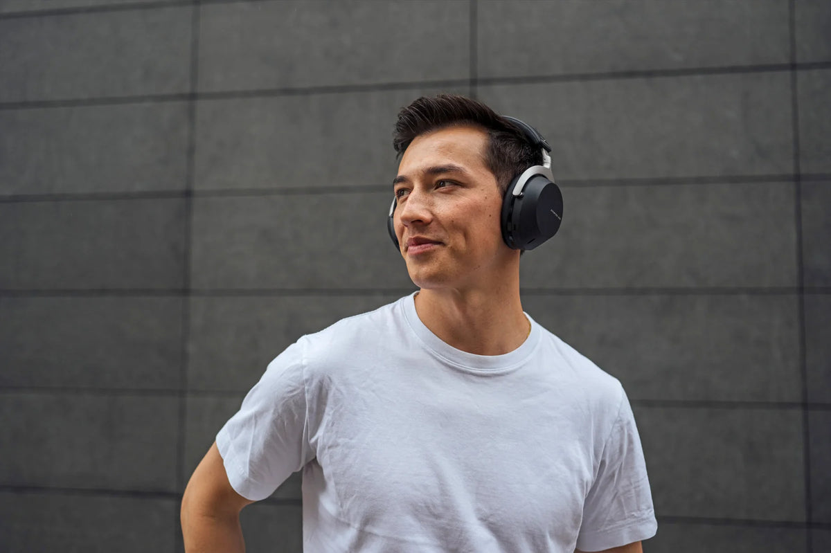 Wireless Beyerdynamic Aventho 300 headphones with over-ear design and sleek black finish, shown from a side angle.