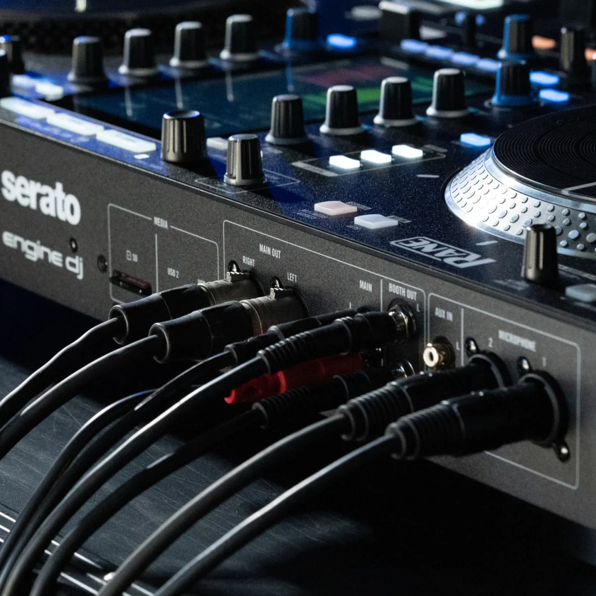 Rane System One DJ controller with jog wheels, mixer controls, and connectivity options for professional DJ setups.