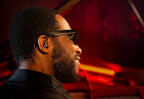 Beyerdynamic DT 72 IE studio in-ear headphones with ergonomic design, used for guitar and voice monitoring.