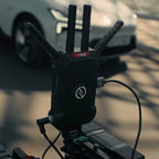 Hollyland Pyro Ultra transmitter mounted on a camera rig